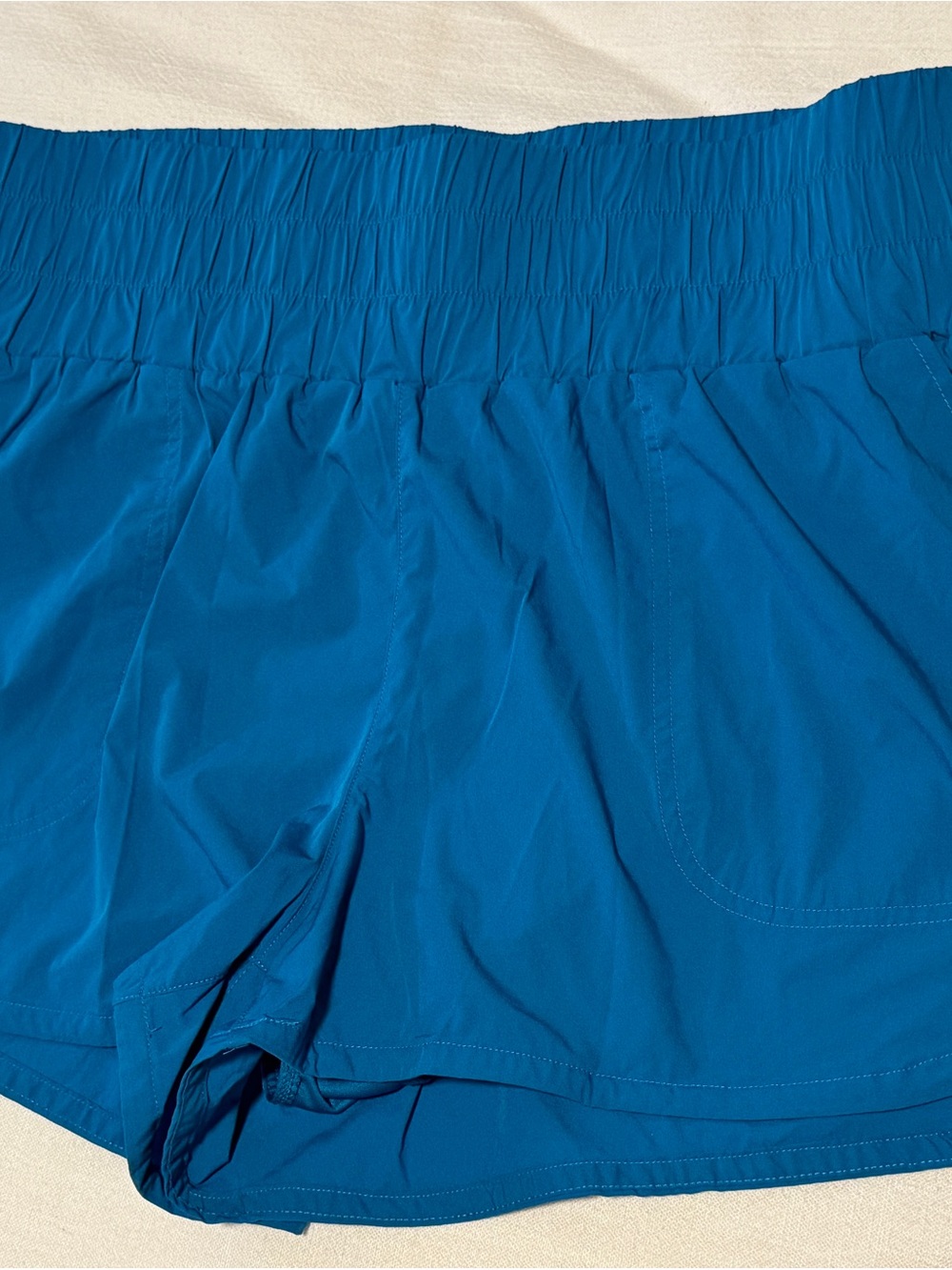 JoyLab Teal Shorts with Orange Logo